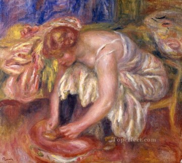 Mujer atándose los cordones de los zapatos Pierre Auguste Renoir Pinturas al óleo